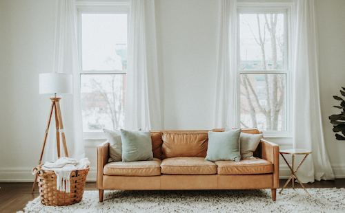 a window behind the couch