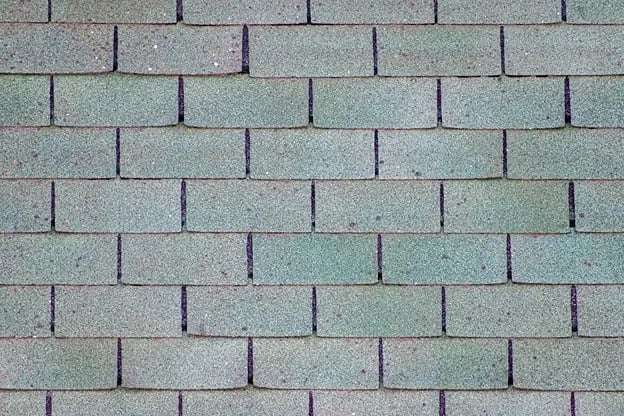 hail-dented-asphalt-shingle-roof