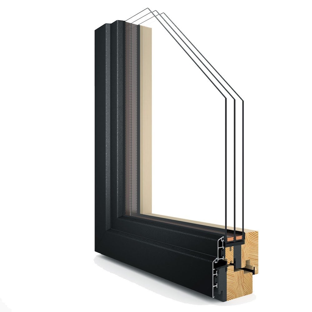 A small corner of a clad window with triple panes and a black cladded exterior. You can see the inside of the frame exposed as if the window was cut in half.