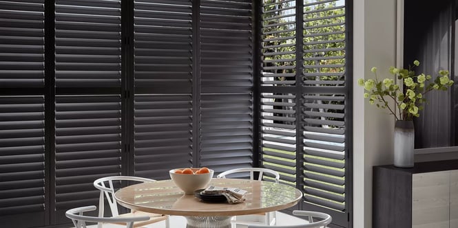 Hunter Douglas heritance shutter in a kitchen bay windows