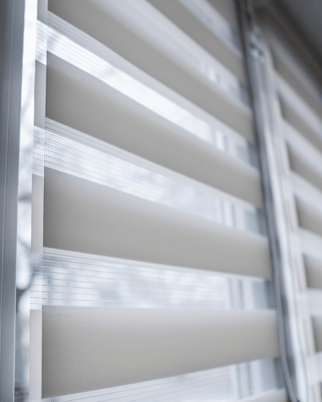 White zebra shades over a window.